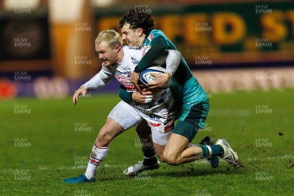 100126 - Scarlets v Section Paloise - Investec Champions Cup - Blair Murray of Scarlets is tackled by Gregoire Arfeuil of Pau