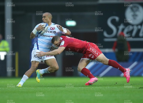 131018 - Scarlets v Racing 92, Champions Cup - Simon Zebo of Racing 92 is tackled by Hadleigh Parkes of Scarlets