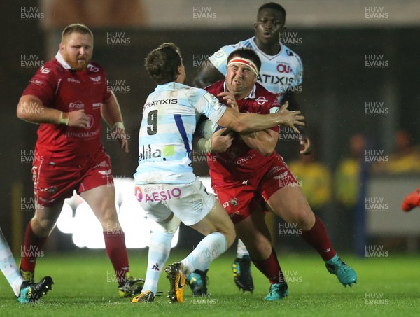 131018 - Scarlets v Racing 92, Champions Cup - Wyn Jones of Scarlets takes on Xavier Chauveau of Racing 92