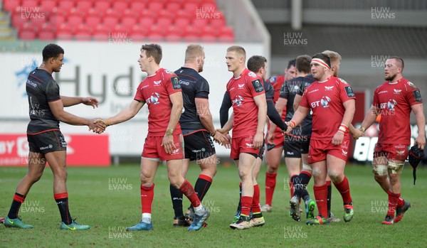 150117 Scarlets v Saracens - Champions Cup - Players from both sides shake hands after the final whistle  by Gwenno Davies/Huw Evans Agency