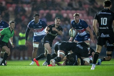 180926 - Scarlets v Saracens - Preseason Friendly - Tomos Williams of Saracens gets the ball away 