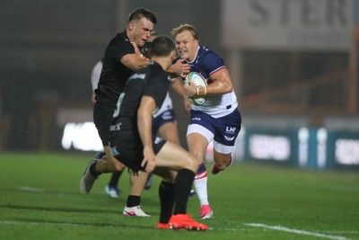 180926 - Scarlets v Saracens - Preseason Friendly - Blair Murray of Scarlets fends off Saracens defenders