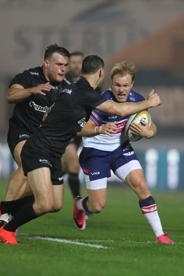 180926 - Scarlets v Saracens - Preseason Friendly - Blair Murray of Scarlets fends off Saracens defenders