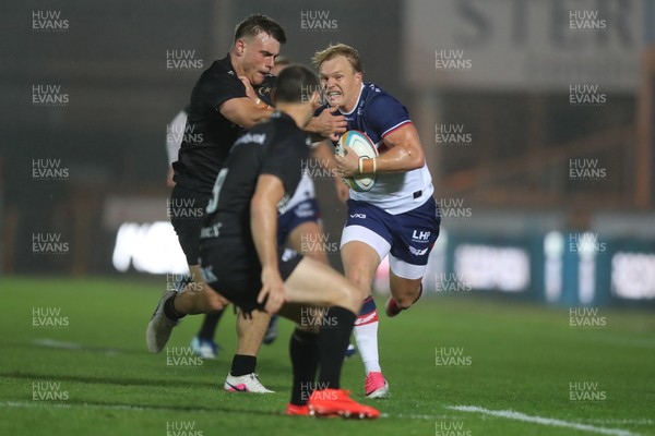 180926 - Scarlets v Saracens - Preseason Friendly - Blair Murray of Scarlets fends off Saracens defenders
