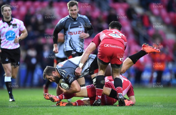 230220 - Scarlets v Southern Kings - Guinness PRO14 - Ruan Lerm of Southern Kings is tackled by Dan Jones and Kieron Fonotia of Scarlets