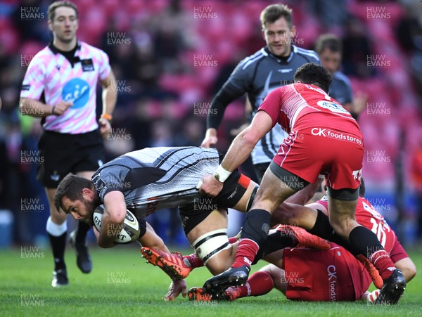 230220 - Scarlets v Southern Kings - Guinness PRO14 - Ruan Lerm of Southern Kings is tackled by Dan Jones and Kieron Fonotia of Scarlets