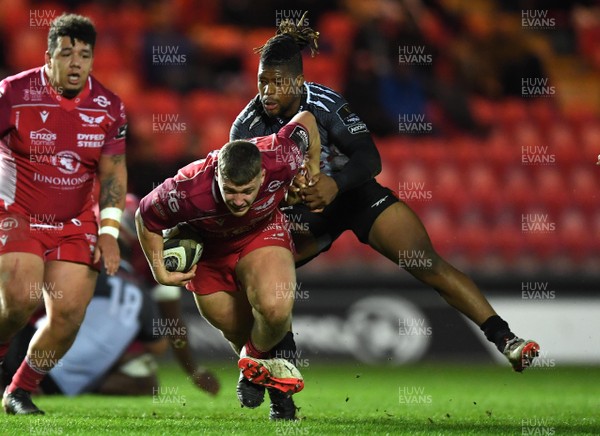 230220 - Scarlets v Southern Kings - Guinness PRO14 - Taylor Davies of Scarlets is tackled by Howard Mnisi of Southern Kings