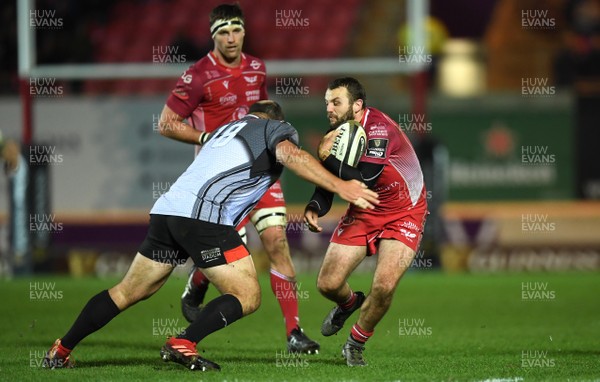 230220 - Scarlets v Southern Kings - Guinness PRO14 - Paul Asquith of Scarlets is tackled by Pieter Scholtz of Southern Kings