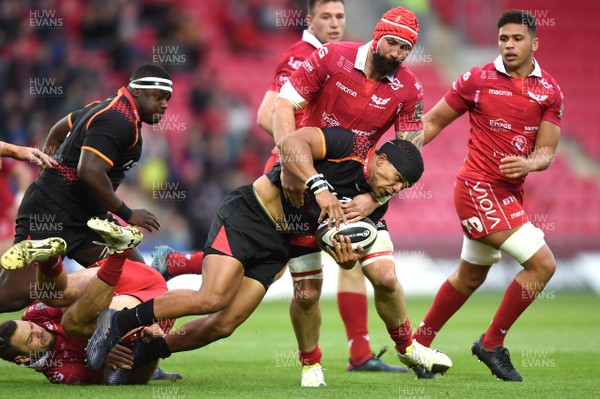 290918 - Scarlets v Southern Kings - Guinness PRO14 - Berton Klaasen of Southern Kings is tackled by Blade Thomson of Scarlets
