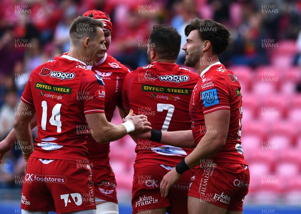 210522 - Scarlets v Stormers - United Rugby Championship - Johnny Williams of Scarlets celebrates try with team mates