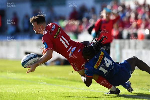 210522 - Scarlets v Stormers - United Rugby Championship - Ryan Conbeer of Scarlets is tackled by Seabelo Senatla of Stormers