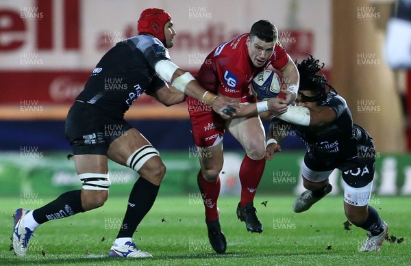 200118 - Scarlets v Toulon - European Rugby Champions Cup - Scott Williams of Scarlets is tackled by Juandre Kruger and Ma'a Nonu of Toulon