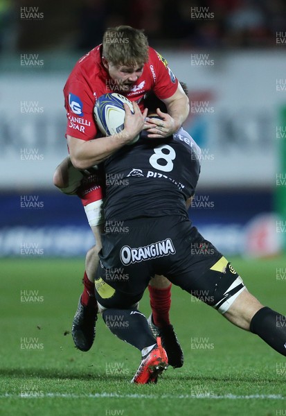200118 - Scarlets v Toulon - European Rugby Champions Cup - James Davies of Scarlets is tackled by Duane Vermeulen of Toulon