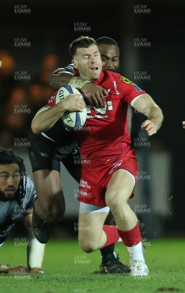 200118 - Scarlets v Toulon, European Champions Cup - Gareth Davies of Scarlets is tackled by Semi Radradra of Toulon