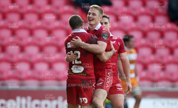 240219 - Scarlets v Toyota Cheetahs - Guinness PRO14 - Paul Asquith celebrates scoring a try with Johnny McNicholl of Scarlets