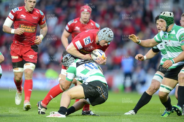 030513 - Scarlets v Treviso - RaboDirect PRO12 -Jonathan Davies of Scarlets is tackled by Michele Campagnaro of Benetton Treviso 