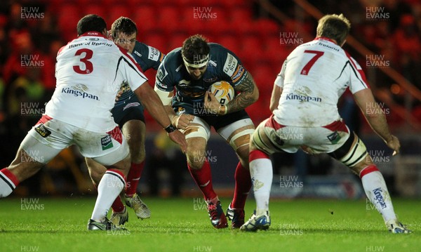 021113  - Scarlets v Ulster - RaboDirect PRO12 -  Scarlets Josh Turnbull takes on Ulster's John Afoa and Roger Wilson