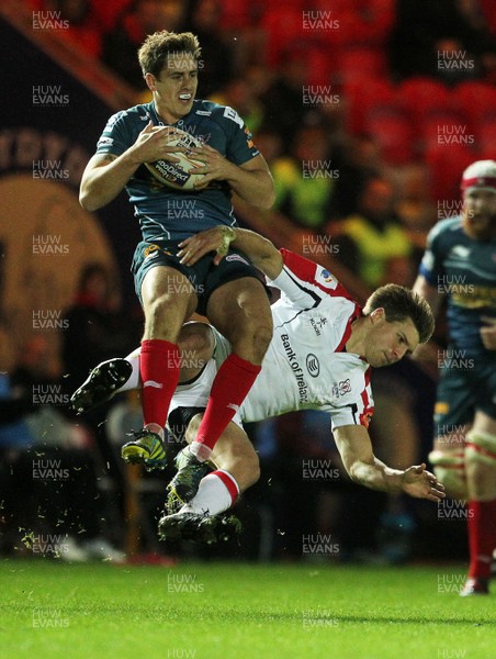 021113  - Scarlets v Ulster - RaboDirect PRO12 -  Scarlets Aled Thomas and Ulster's Andrew Trimble collide in the air