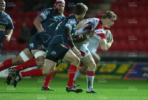 021113 - Scarlets v Ulster, RaboDirect PRO12 - Ulster's Michael Allen is caught by the Scarlets defence