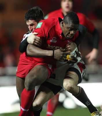 05.03.10 ... Scarlets v Ulster, Magners League -  Scarlets' Joe Ajuwa is tackled by Ulster's Ian Humphreys just short of the tryline 