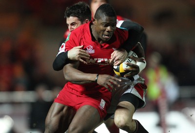 05.03.10 ... Scarlets v Ulster, Magners League -  Scarlets' Joe Ajuwa is tackled by Ulster's Ian Humphreys just short of the tryline 