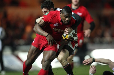 05.03.10 ... Scarlets v Ulster, Magners League -  Scarlets' Joe Ajuwa is tackled by Ulster's Ian Humphreys just short of the tryline 