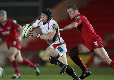 05.03.10 ... Scarlets v Ulster, Magners League -  Ulster's Isaac Boss breaks away from Scarlets' Tavis Knoyle    