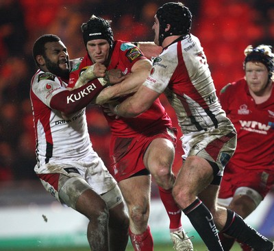 05.03.10 ... Scarlets v Ulster, Magners League -  Scarlets' Iestyn Thomas takes on Ulster's Timoci Nagusa and David Pollock  