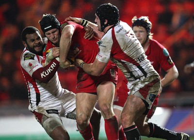 05.03.10 ... Scarlets v Ulster, Magners League -  Scarlets' Iestyn Thomas takes on Ulster's Timoci Nagusa and David Pollock  