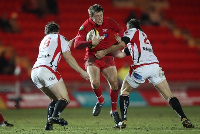 05.03.10 ... Scarlets v Ulster, Magners League -  Scarlets' Rhys Priestland is tackled by Ulster's Simon Danielli and Willie Faloon  