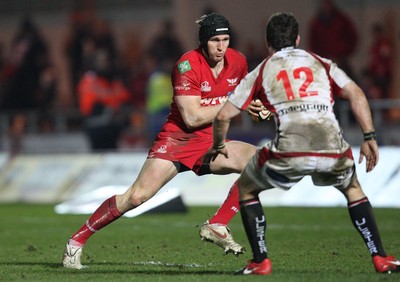 05.03.10 ... Scarlets v Ulster, Magners League -  Scarlets' Andy Fenby takes on Ulster's Paddy Wallace  