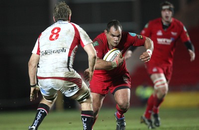 05.03.10 ... Scarlets v Ulster, Magners League -  Scarlets' Deacon Manu takes on Ulster's Chris Henry  