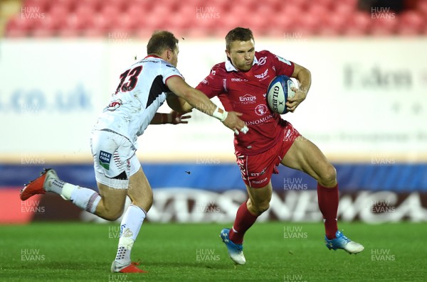 071218 - Scarlets v Ulster - European Rugby Champions Cup - Tom Prydie of Scarlets is tackled by Will Addison of Ulster