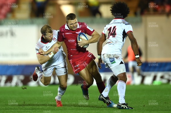 071218 - Scarlets v Ulster - European Rugby Champions Cup - Tom Prydie of Scarlets is tackled by Will Addison of Ulster