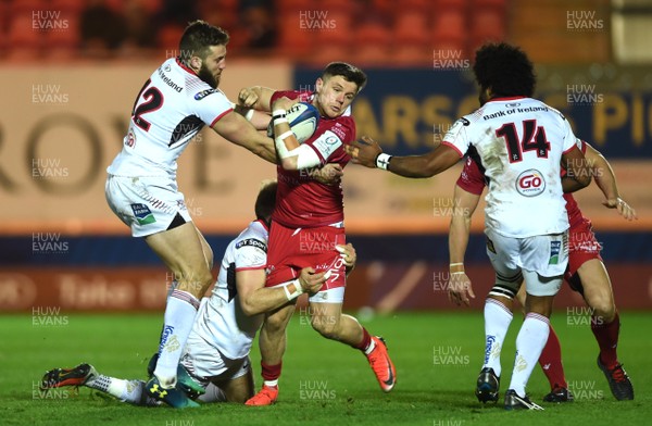 071218 - Scarlets v Ulster - European Rugby Champions Cup - Steff Evans of Scarlets is tackled by Stuart McCloskey, Will Addison and Henry Speight of Ulster