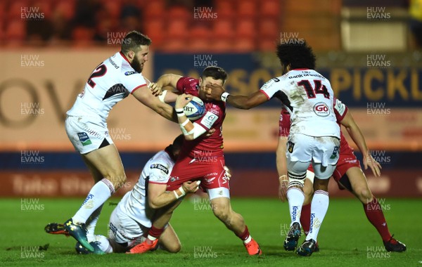 071218 - Scarlets v Ulster - European Rugby Champions Cup - Steff Evans of Scarlets is tackled by Stuart McCloskey, Will Addison and Henry Speight of Ulster