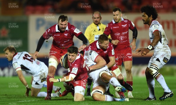 071218 - Scarlets v Ulster - European Rugby Champions Cup - Steff Evans of Scarlets is tackled by Jordi Murphy of Ulster