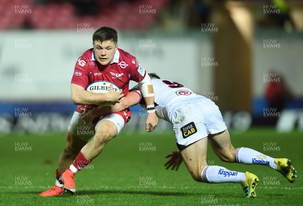 071218 - Scarlets v Ulster - European Rugby Champions Cup - Steff Evans of Scarlets is held by John Cooney of Ulster
