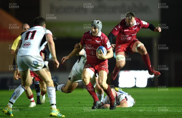 071218 - Scarlets v Ulster - European Rugby Champions Cup - Jonathan Davies of Scarlets beats tackle by John Cooney of Ulster