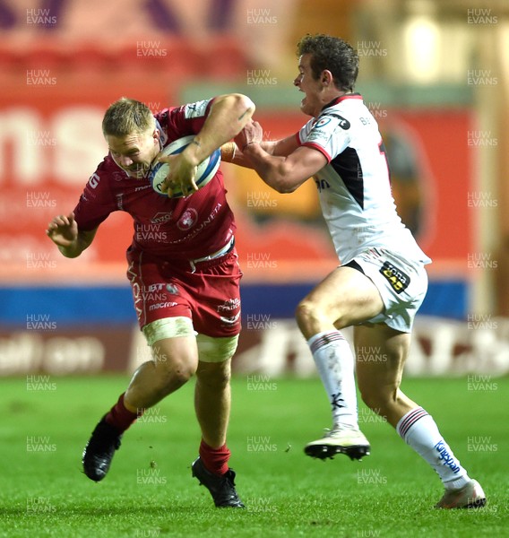 071218 - Scarlets v Ulster - European Rugby Champions Cup - James Davies of Scarlets is tackled by Billy Burns of Ulster