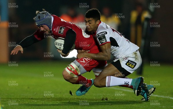 231118 - Scarlets v Ulster - Guinness PRO14 - Will Boyde of Scarlets is tackled by Robert Baloucoune of Ulster
