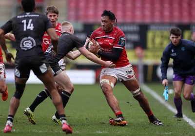 240126 - Scarlets v Ulster - United Rugby Championship - Sam Lousi of Scarlets is tackled by Nathan Doak of Ulster 