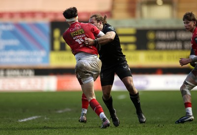 240126 - Scarlets v Ulster - United Rugby Championship - Werner Kok of Ulster is given a yellow car for this tackle on Tom Rogers of Scarlets 