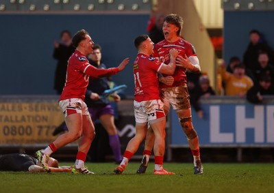 240126 - Scarlets v Ulster - United Rugby Championship - Ellis Mee of Scarlets celebrates scoring a try with team mates after winning the match in the last play of the game
