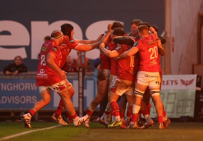 240126 - Scarlets v Ulster - United Rugby Championship - Ellis Mee of Scarlets celebrates scoring a try with team mates after winning the match in the last play of the game