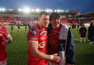 240126 - Scarlets v Ulster - United Rugby Championship - Jarrod Taylor and Archer Holz of Scarlets thanks the fans at full time