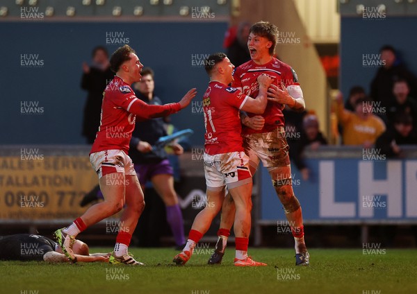 240126 - Scarlets v Ulster - United Rugby Championship - Ellis Mee of Scarlets celebrates scoring a try with team mates after winning the match in the last play of the game