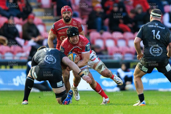 240126 - Scarlets v Ulster - United Rugby Championship - Jac Price of Scarlets is tackled by Harry Sheridan of Ulster