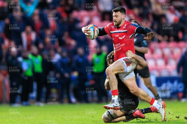 240126 - Scarlets v Ulster - United Rugby Championship - Johnny Williams of Scarlets is tackled by Dave McCann of Ulster just short of the try line