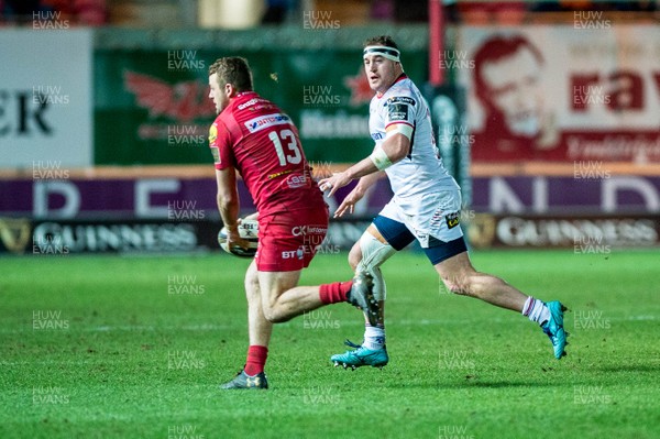 240218 - Scarlets v Ulster, Guinness PRO14 -  Rob Herring of Ulster chases down Paul Asquith  of Scarlets